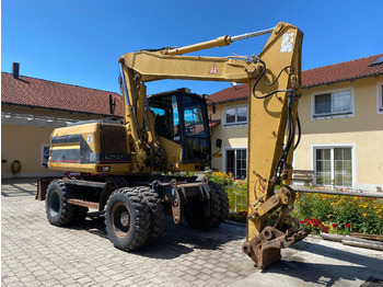 Hjulgravemaskine CATERPILLAR M312