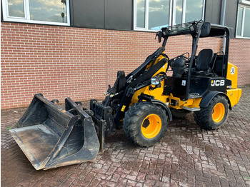 Skridstyret minilæsser på bånd JCB 403