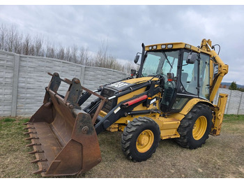Gravelæssemaskine CATERPILLAR