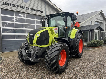 Leje en Claas Axion 830 med frontlift og front PTO Claas Axion 830 med frontlift og front PTO: billede 5 Leje en Claas Axion 830 med frontlift og front PTO Claas Axion 830 med frontlift og front PTO: billede 5