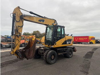 Hjulgravemaskine CATERPILLAR M313D