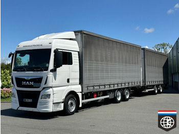 Lastbil med presenning MAN TGX 26.480
