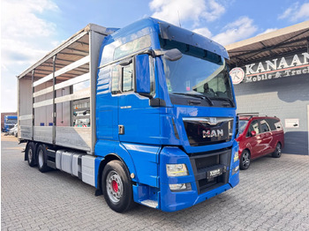 Lastbil med presenning MAN TGX 26.500