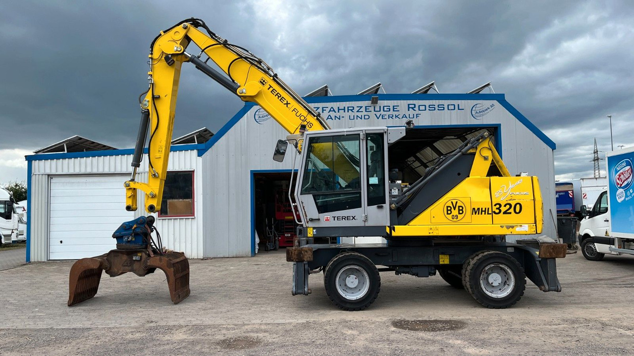 Fuchs TeRex MHL 320 D Umschlagbagger Greifer Pratzen - Materialhåndteringsmaskine: billede 1 Fuchs TeRex MHL 320 D Umschlagbagger Greifer Pratzen - Materialhåndteringsmaskine: billede 1