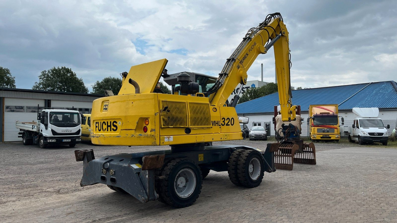 Fuchs TeRex MHL 320 D Umschlagbagger Greifer Pratzen - Materialhåndteringsmaskine: billede 5 Fuchs TeRex MHL 320 D Umschlagbagger Greifer Pratzen - Materialhåndteringsmaskine: billede 5