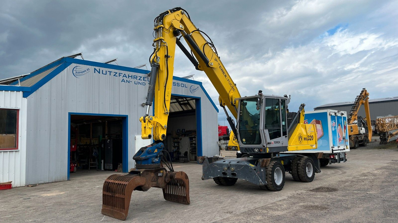 Fuchs TeRex MHL 320 D Umschlagbagger Greifer Pratzen - Materialhåndteringsmaskine: billede 3 Fuchs TeRex MHL 320 D Umschlagbagger Greifer Pratzen - Materialhåndteringsmaskine: billede 3