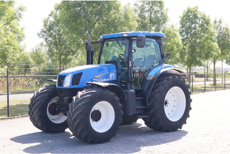 New Holland TS135A | 40 KM/H | 4X4 | SUPERSTEER - Traktor: billede 1 New Holland TS135A | 40 KM/H | 4X4 | SUPERSTEER - Traktor: billede 1