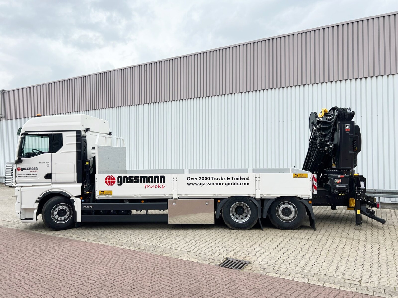 MAN TGX 26.510 6x2-4 LL CH TGX 26.510 6x2-4 LL, Kran Hiab X-HiPro 548 E-8, Lenk-/Liftachse, TwistLock 20Fuß, Funk, Retarder - Lastbil med kran, Lastbil med lad: billede 2 MAN TGX 26.510 6x2-4 LL CH TGX 26.510 6x2-4 LL, Kran Hiab X-HiPro 548 E-8, Lenk-/Liftachse, TwistLock 20Fuß, Funk, Retarder - Lastbil med kran, Lastbil med lad: billede 2