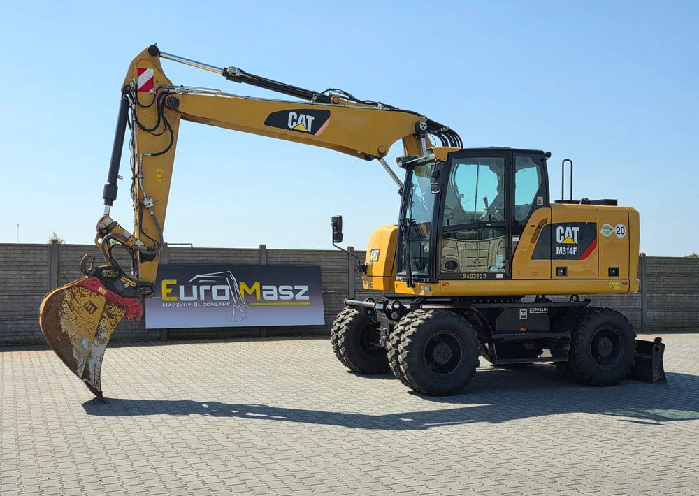 Caterpillar M314F, 2019 ROK, 3300 MTH, OIL QUICK OQ 65 - Hjulgravemaskine: billede 1 Caterpillar M314F, 2019 ROK, 3300 MTH, OIL QUICK OQ 65 - Hjulgravemaskine: billede 1