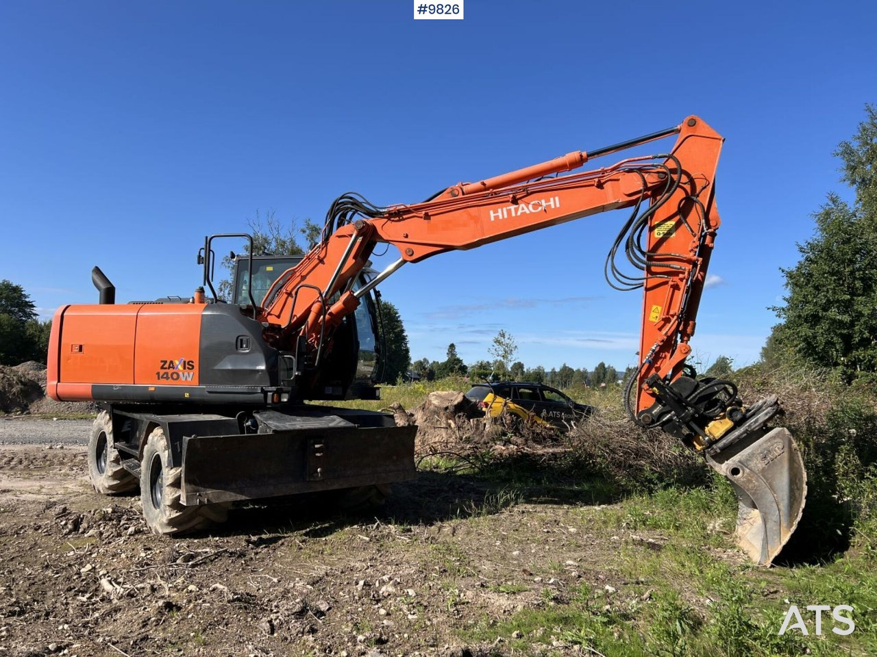 Hitachi ZX140 W-5B with rotor and planer bucket - Hjulgravemaskine: billede 1 Hitachi ZX140 W-5B with rotor and planer bucket - Hjulgravemaskine: billede 1