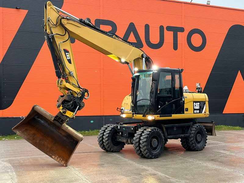 Caterpillar M316D / ROTOTILT/ AC / CENTRAL LUBRICATION / + EXTRA BUCKET - Hjulgravemaskine: billede 1 Caterpillar M316D / ROTOTILT/ AC / CENTRAL LUBRICATION / + EXTRA BUCKET - Hjulgravemaskine: billede 1