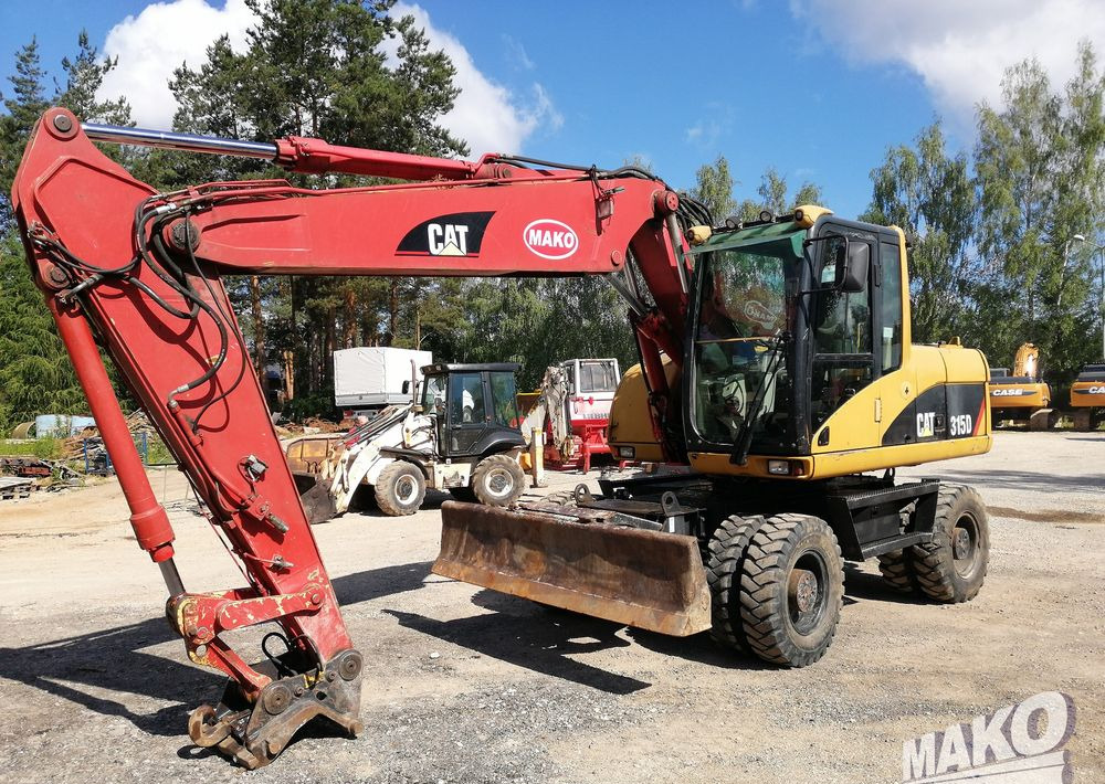 Caterpillar M315 C - Hjulgravemaskine: billede 1 Caterpillar M315 C - Hjulgravemaskine: billede 1