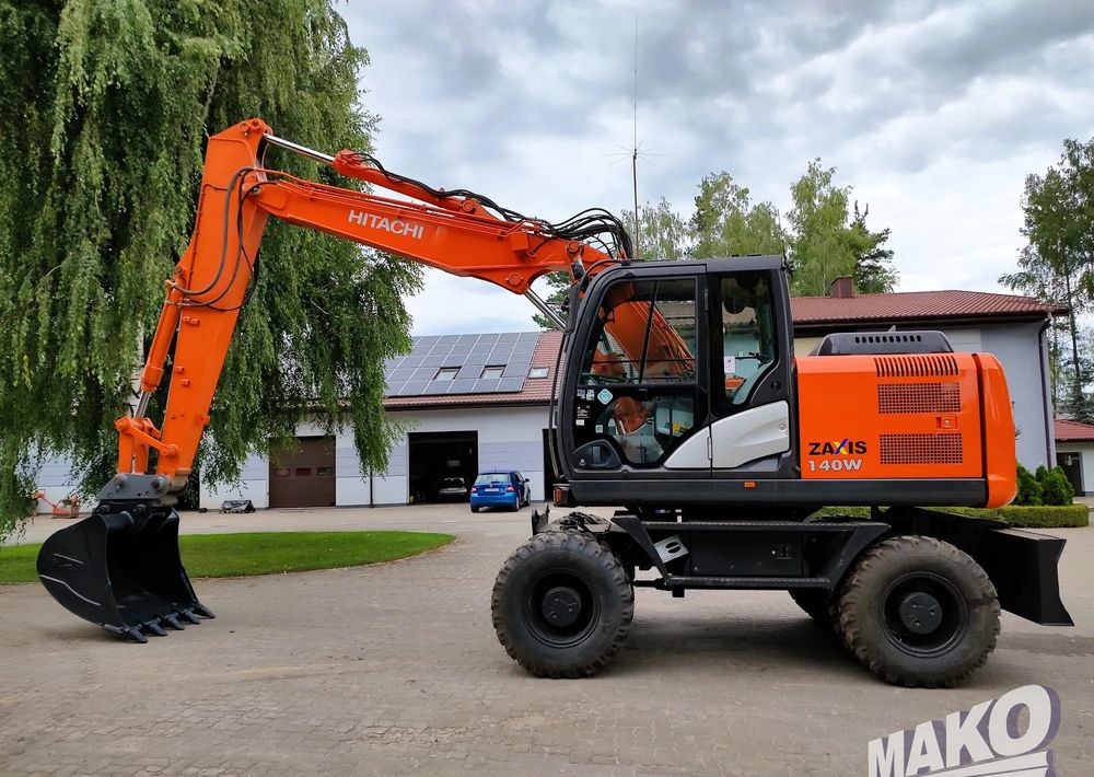 Hitachi ZX 140 - Hjulgravemaskine: billede 1 Hitachi ZX 140 - Hjulgravemaskine: billede 1