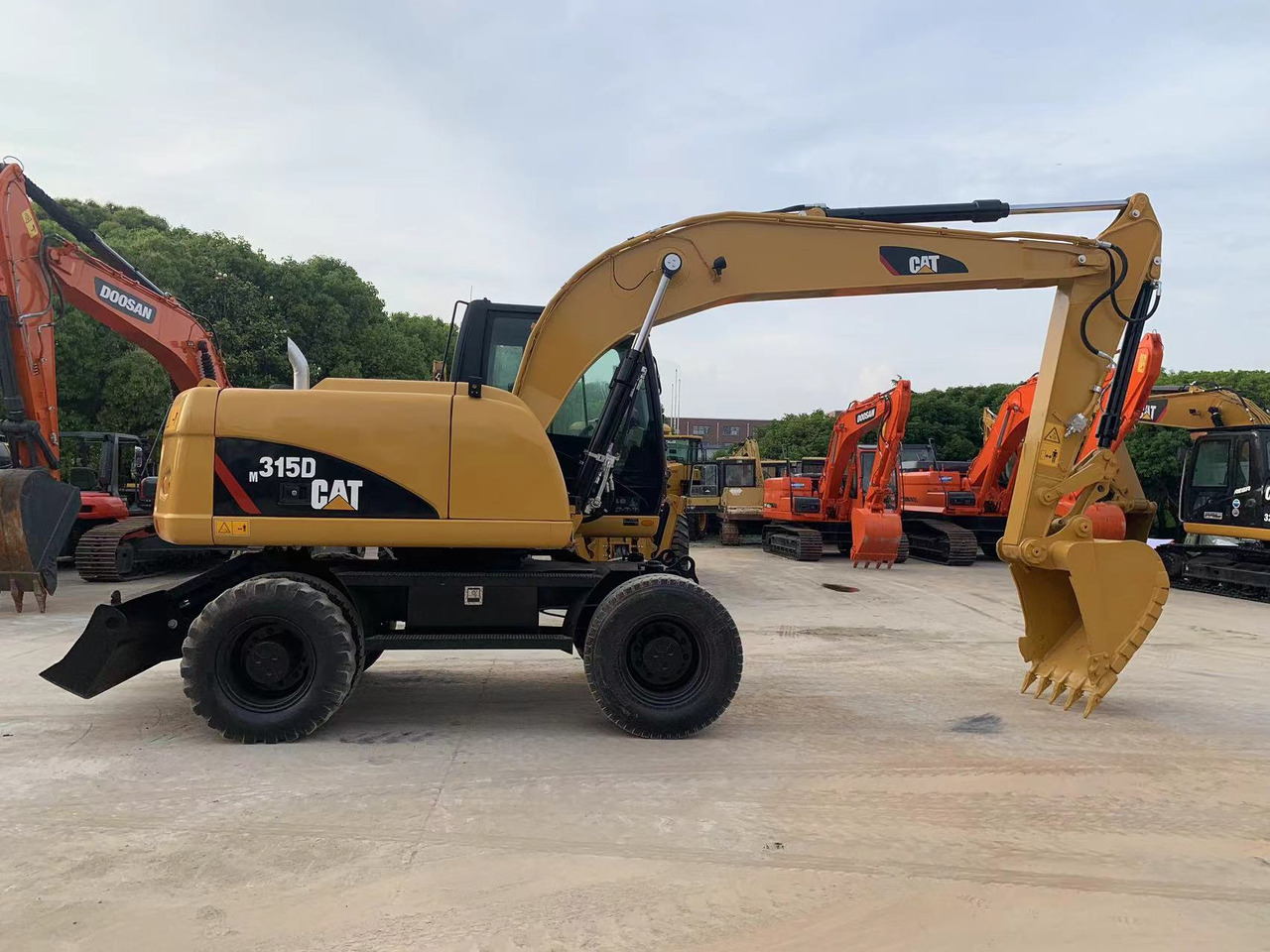 Caterpillar M315D Wheel Excavator Moving by Tires - Hjulgravemaskine: billede 1 Caterpillar M315D Wheel Excavator Moving by Tires - Hjulgravemaskine: billede 1