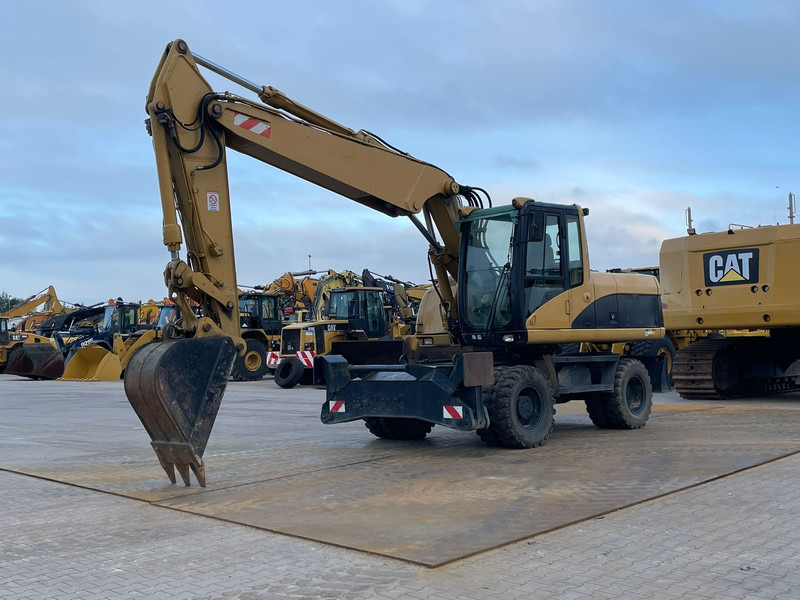 Caterpillar M318C - Gravemaskine: billede 2 Caterpillar M318C - Gravemaskine: billede 2