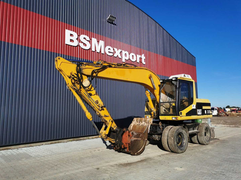 Caterpillar M315 wheel excavator - Hjulgravemaskine: billede 2 Caterpillar M315 wheel excavator - Hjulgravemaskine: billede 2