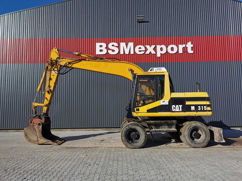 Caterpillar M315 wheel excavator - Hjulgravemaskine: billede 1 Caterpillar M315 wheel excavator - Hjulgravemaskine: billede 1