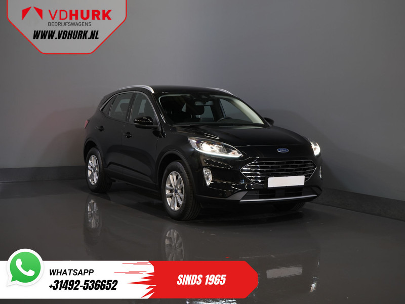 Ford Kuga 2.5 PHEV 225 pk Titanium Navi/ Carplay/ Stoelverw./ Stuurverw./ Camera/ PDC/ Climate - SUV: billede 1 Ford Kuga 2.5 PHEV 225 pk Titanium Navi/ Carplay/ Stoelverw./ Stuurverw./ Camera/ PDC/ Climate - SUV: billede 1