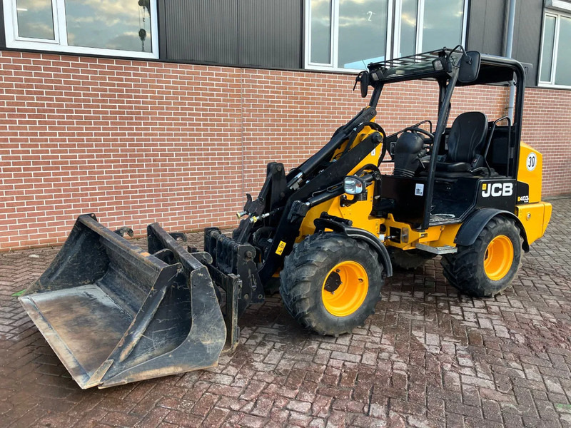JCB 403 PLUS - Skridstyret minilæsser på bånd: billede 1 JCB 403 PLUS - Skridstyret minilæsser på bånd: billede 1