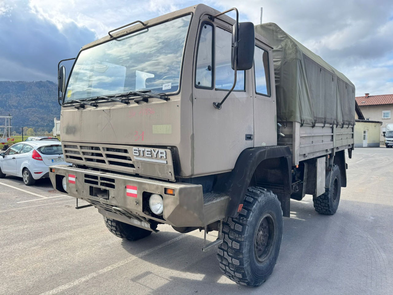 Steyr 12M18 4X4 stake body -  truck - Lastbil med presenning: billede 1 Steyr 12M18 4X4 stake body -  truck - Lastbil med presenning: billede 1