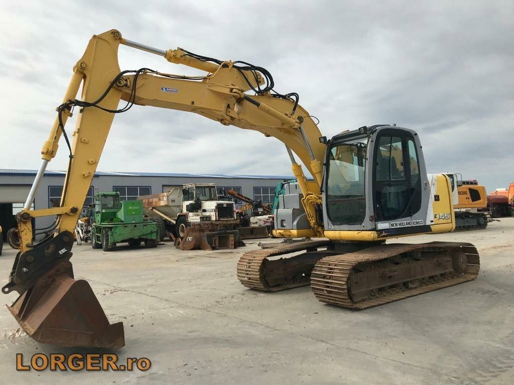 New Holland E 145 - Bæltegravemaskine: billede 1 New Holland E 145 - Bæltegravemaskine: billede 1