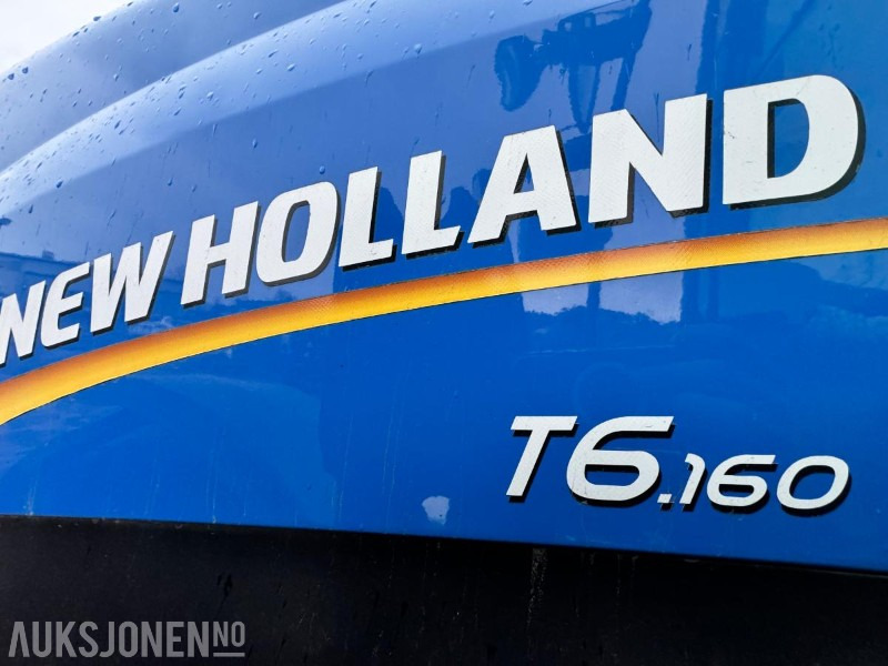 Traktor 2013 New Holland T6.160 - Frontlaster - 1 skuffe - Triangel og toppstag - TRI piggdekk og landbruksdekk: billede 9 Traktor 2013 New Holland T6.160 - Frontlaster - 1 skuffe - Triangel og toppstag - TRI piggdekk og landbruksdekk: billede 9