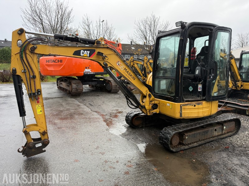 Cat 303.5E - Minigraver - SMP hurtigfeste S40 - SMP graveskuff + smalskuff - 7204 timer - Minigravemaskine: billede 1 Cat 303.5E - Minigraver - SMP hurtigfeste S40 - SMP graveskuff + smalskuff - 7204 timer - Minigravemaskine: billede 1