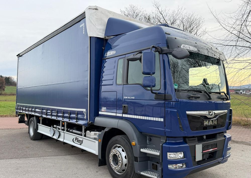 MAN TGM 18.340 / FIRANKA / LIFT / SPROWADZONY / KLIMA POSTOJOWA / 2017 / 9700 ŁADOWNOŚĆ / AUTOMAT / 18 PALET / E6 / WINDA / - Lastbil med presenning: billede 1 MAN TGM 18.340 / FIRANKA / LIFT / SPROWADZONY / KLIMA POSTOJOWA / 2017 / 9700 ŁADOWNOŚĆ / AUTOMAT / 18 PALET / E6 / WINDA / - Lastbil med presenning: billede 1