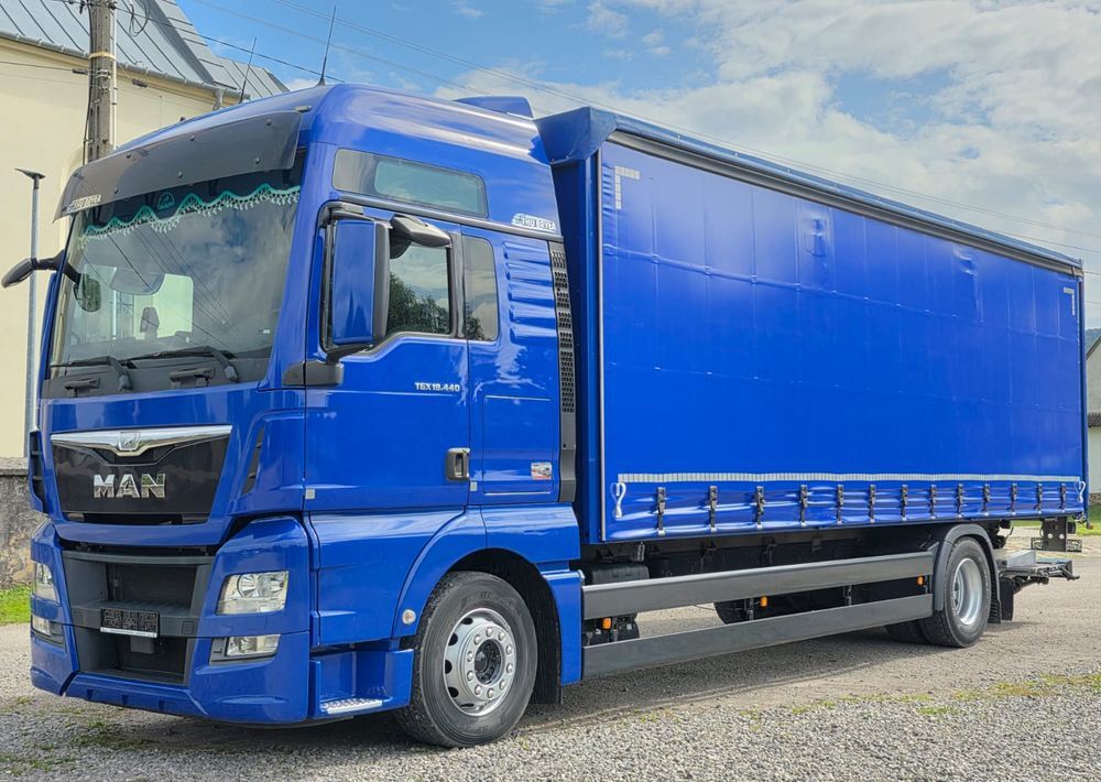 MAN TGX 18.440 / FIRANKA / NISKI PRZEBIEG / 20 EURO PALET / SPROWADZONY / E6 / AUTOMAT / LODÓWKA / KAMERA / WINDA / DUŻA KABINA / SILNIK 13 LITRÓW - Lastbil med presenning: billede 1 MAN TGX 18.440 / FIRANKA / NISKI PRZEBIEG / 20 EURO PALET / SPROWADZONY / E6 / AUTOMAT / LODÓWKA / KAMERA / WINDA / DUŻA KABINA / SILNIK 13 LITRÓW - Lastbil med presenning: billede 1