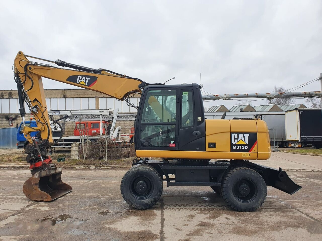 Caterpillar M 313 D Tiltrotator - Hjulgravemaskine: billede 1 Caterpillar M 313 D Tiltrotator - Hjulgravemaskine: billede 1