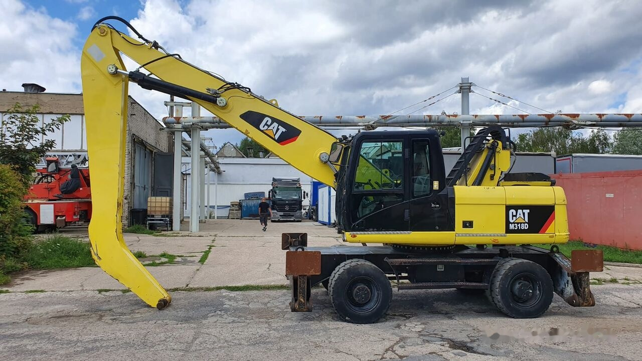 Caterpillar M 318 D MH - Materialhåndteringsmaskine: billede 1 Caterpillar M 318 D MH - Materialhåndteringsmaskine: billede 1