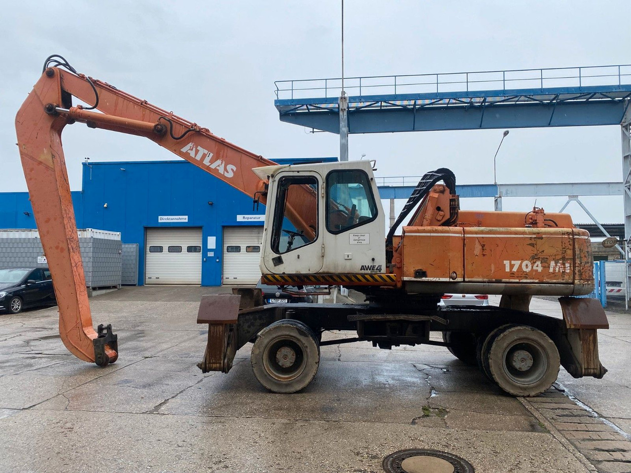 Atlas 1704 MI mit Greifer Umschlagbagger Lang - Hjulgravemaskine: billede 1 Atlas 1704 MI mit Greifer Umschlagbagger Lang - Hjulgravemaskine: billede 1