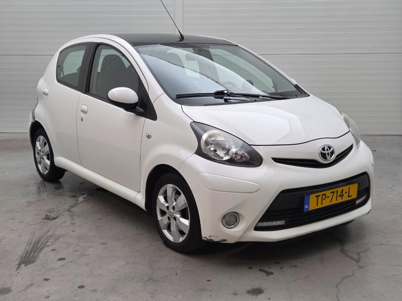 Toyota Aygo 1.0 VVT - i Now | 2014 | 131.940 km | TP714L | NAP: Geen oordeel - Hatchback: billede 2 Toyota Aygo 1.0 VVT - i Now | 2014 | 131.940 km | TP714L | NAP: Geen oordeel - Hatchback: billede 2