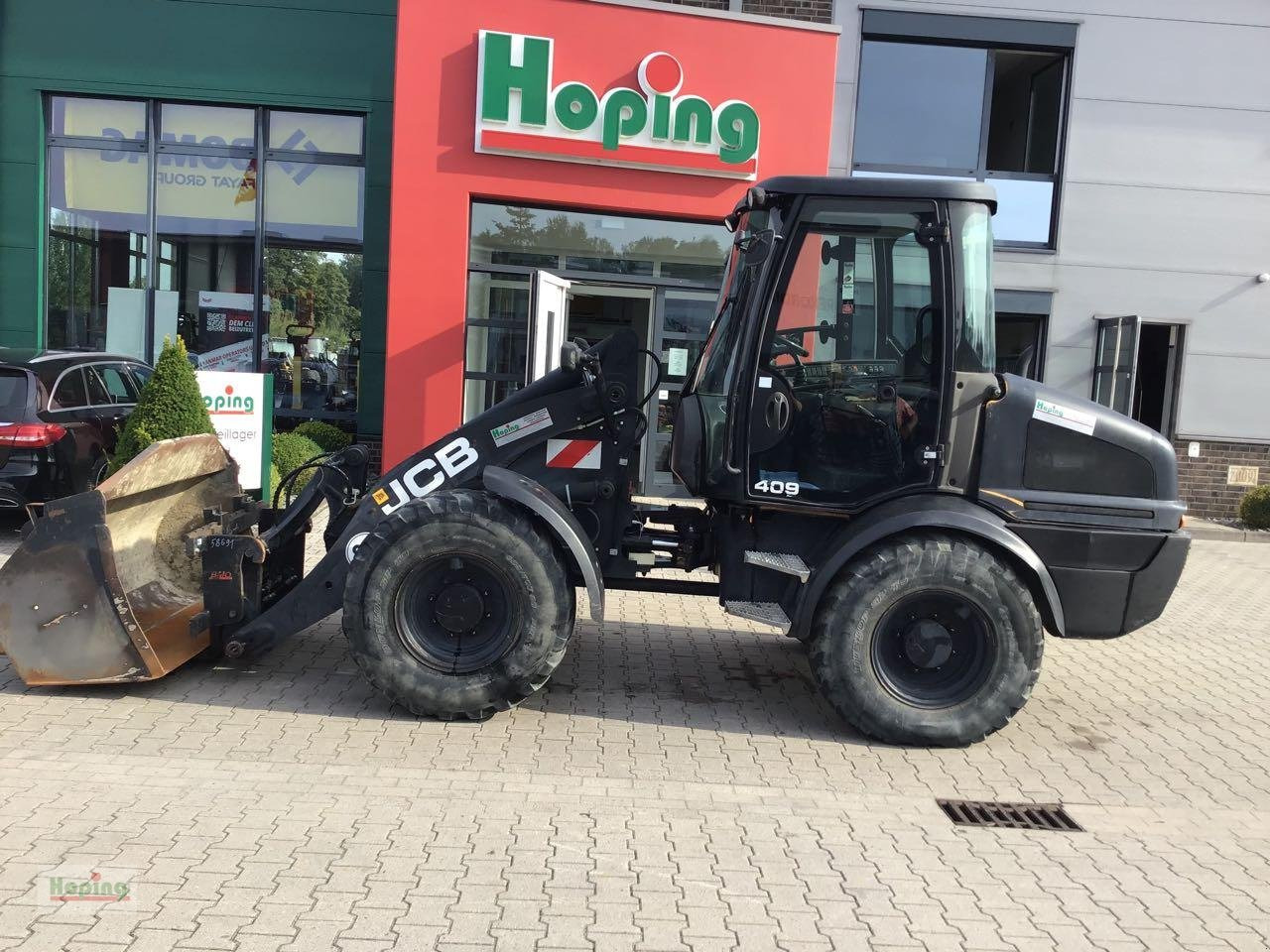 JCB 409 - Gummihjulslæsser: billede 1 JCB 409 - Gummihjulslæsser: billede 1