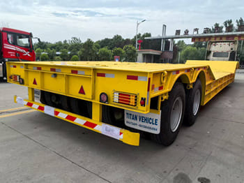 TITAN Rgn Lowboy Trailer for Sale in Zambia - Nedbygget platform sættevogn: billede 1 TITAN Rgn Lowboy Trailer for Sale in Zambia - Nedbygget platform sættevogn: billede 1