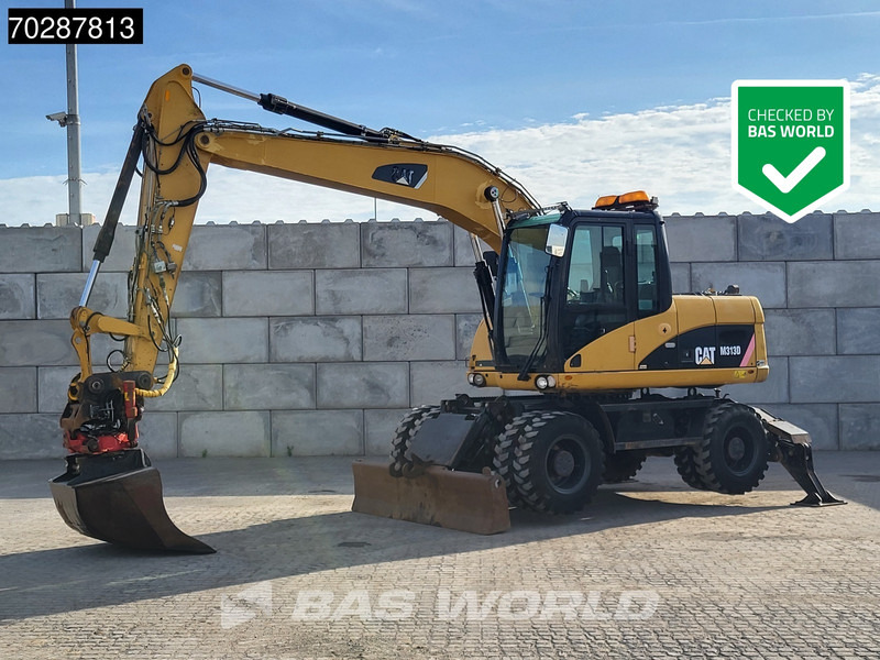 Caterpillar M313 D OUTRIGGERS + BLADE - Hjulgravemaskine: billede 1 Caterpillar M313 D OUTRIGGERS + BLADE - Hjulgravemaskine: billede 1