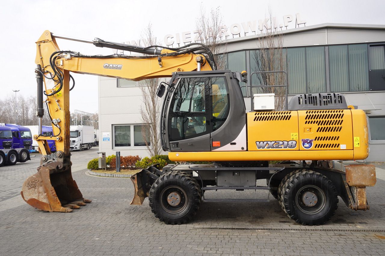 CASE WX218 / 23t wheeled excavator / 3 times folding arm - Hjulgravemaskine: billede 1 CASE WX218 / 23t wheeled excavator / 3 times folding arm - Hjulgravemaskine: billede 1