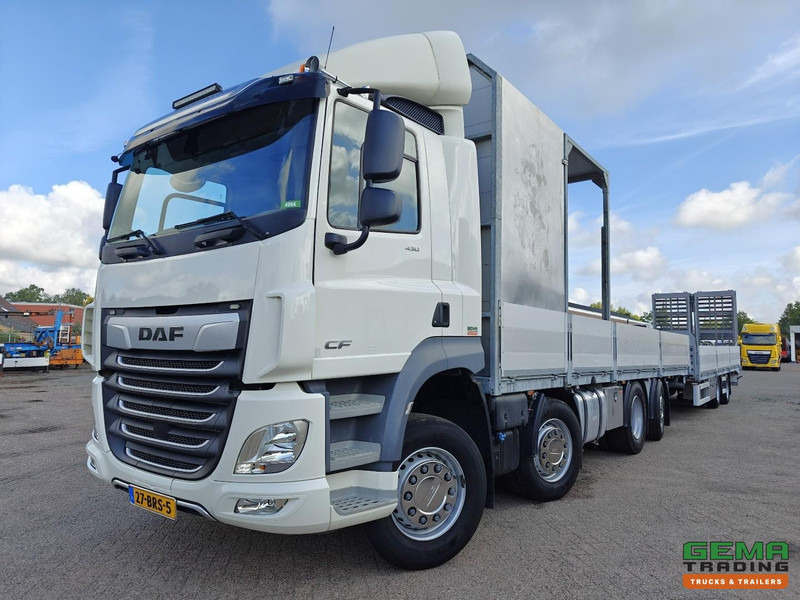 DAF CF 430 FAX 8x2/6 Dagcabine Euro6D - Machine Transporter + 2assige Aanhanger - Hydraulische Rampen - Afneembare 10.000L WaterTank - 20.000km! Origineel - Biltransportør lastbil: billede 1 DAF CF 430 FAX 8x2/6 Dagcabine Euro6D - Machine Transporter + 2assige Aanhanger - Hydraulische Rampen - Afneembare 10.000L WaterTank - 20.000km! Origineel - Biltransportør lastbil: billede 1