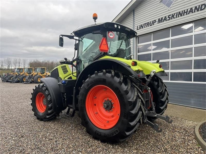 Leje en Claas Axion 830 med frontlift og front PTO Claas Axion 830 med frontlift og front PTO: billede 9 Leje en Claas Axion 830 med frontlift og front PTO Claas Axion 830 med frontlift og front PTO: billede 9