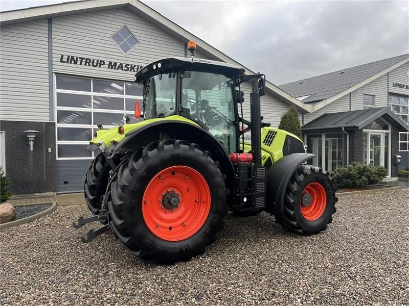 Leje en Claas Axion 830 med frontlift og front PTO Claas Axion 830 med frontlift og front PTO: billede 13 Leje en Claas Axion 830 med frontlift og front PTO Claas Axion 830 med frontlift og front PTO: billede 13