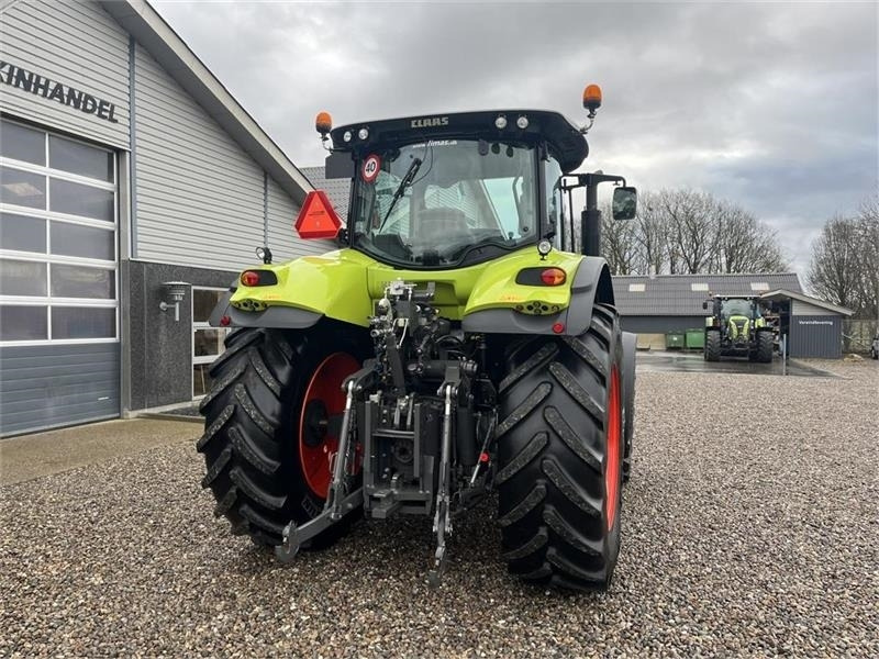 Leje en Claas Axion 830 med frontlift og front PTO Claas Axion 830 med frontlift og front PTO: billede 15 Leje en Claas Axion 830 med frontlift og front PTO Claas Axion 830 med frontlift og front PTO: billede 15