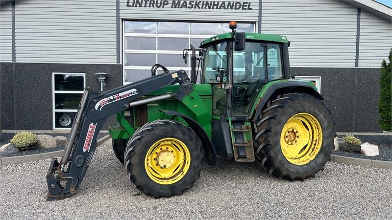 John Deere 6910 Auto Quad II-TLS Med frontlæsser - Traktor: billede 1 John Deere 6910 Auto Quad II-TLS Med frontlæsser - Traktor: billede 1
