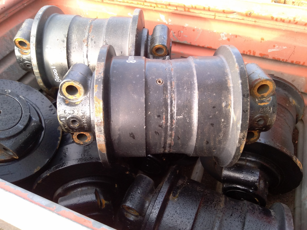 O&K UQ908D00N00008 - - Larvebånd - Rulle for Entreprenørmaskin: billede 1 O&K UQ908D00N00008 - - Larvebånd - Rulle for Entreprenørmaskin: billede 1