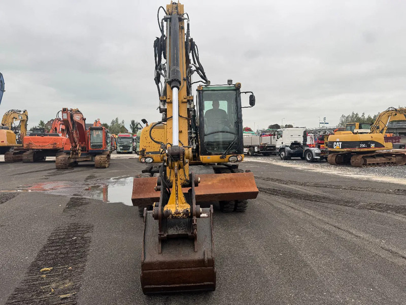 Caterpillar M313D 7212 HOURS - Hjulgravemaskine: billede 2 Caterpillar M313D 7212 HOURS - Hjulgravemaskine: billede 2
