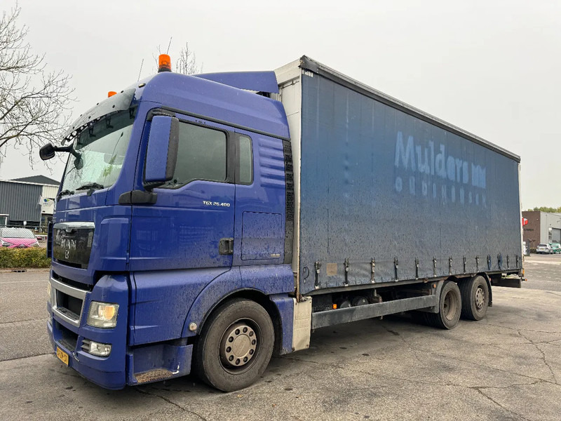 MAN TGX 26.400 6X2 - EURO 4 + LIFT + STEERING AXLE - Lastbil med presenning: billede 1 MAN TGX 26.400 6X2 - EURO 4 + LIFT + STEERING AXLE - Lastbil med presenning: billede 1