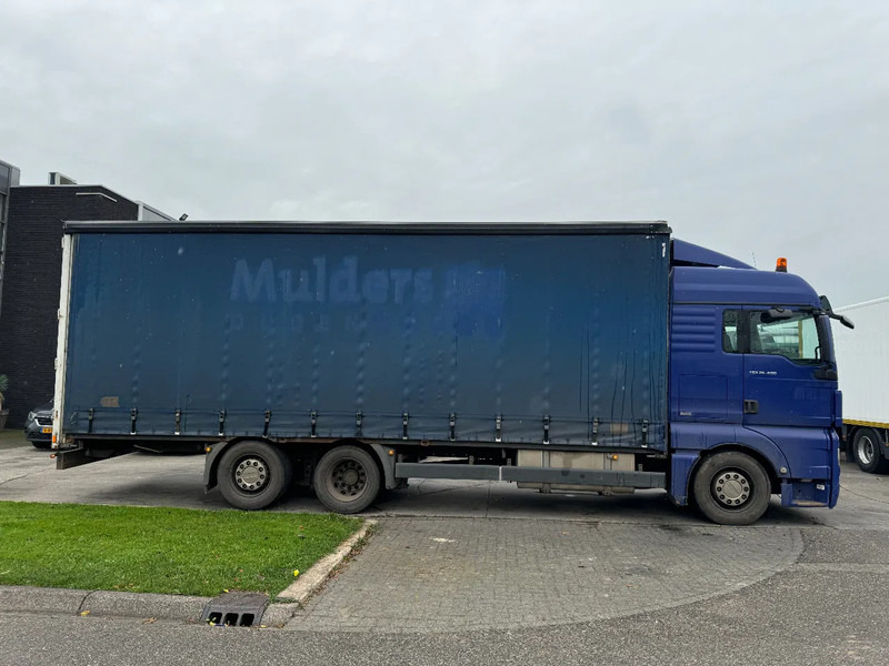 MAN TGX 26.400 6X2 - EURO 4 + LIFT + STEERING AXLE - Lastbil med presenning: billede 4 MAN TGX 26.400 6X2 - EURO 4 + LIFT + STEERING AXLE - Lastbil med presenning: billede 4