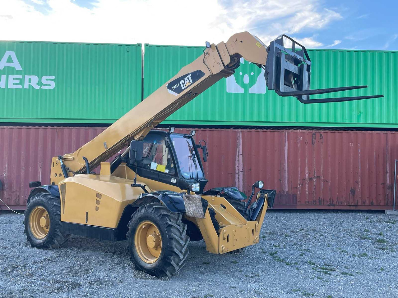 Caterpillar TH414 - Gummihjulslæsser: billede 1 Caterpillar TH414 - Gummihjulslæsser: billede 1