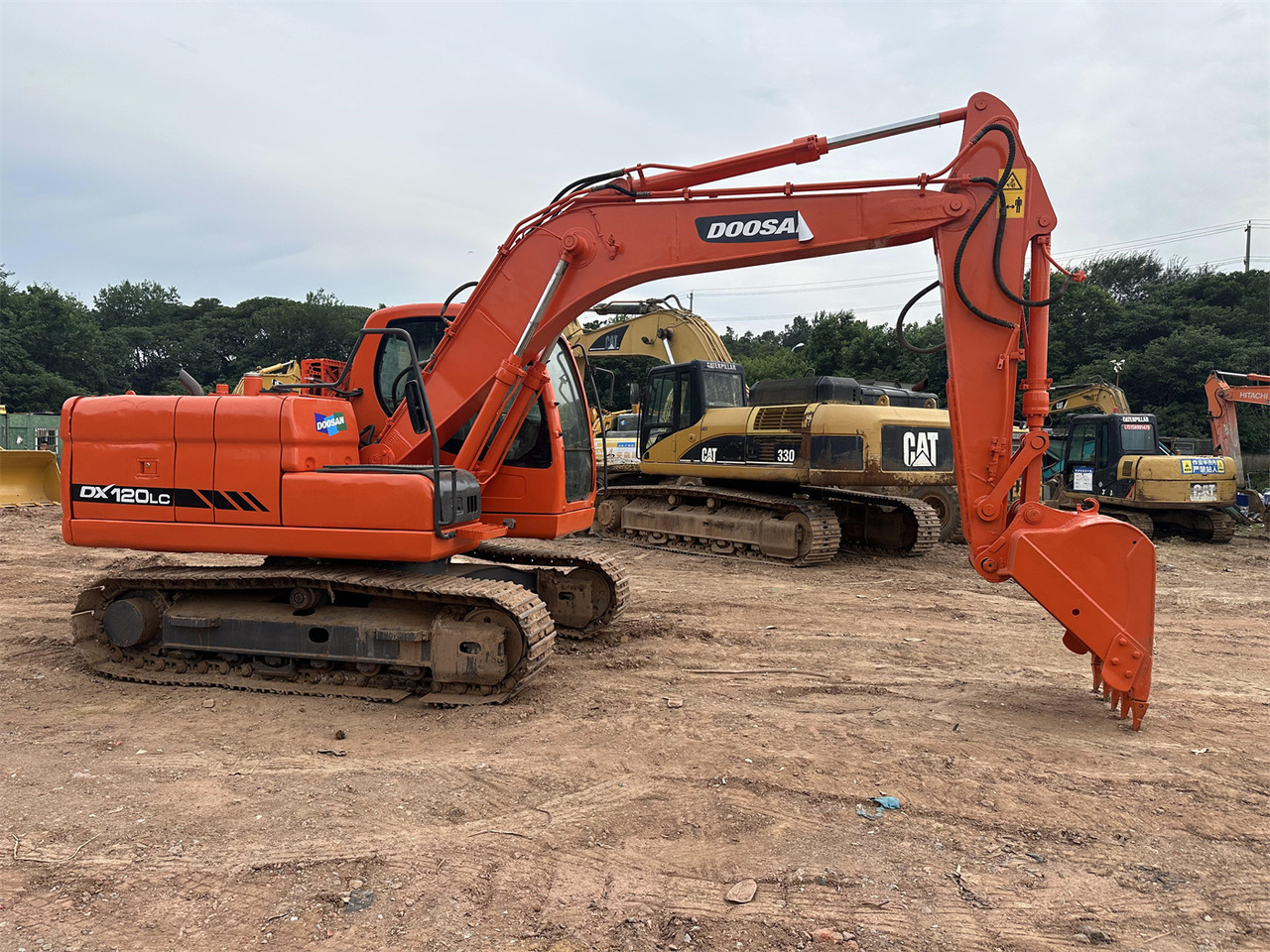 Doosan DX120 - Bæltegravemaskine: billede 1 Doosan DX120 - Bæltegravemaskine: billede 1