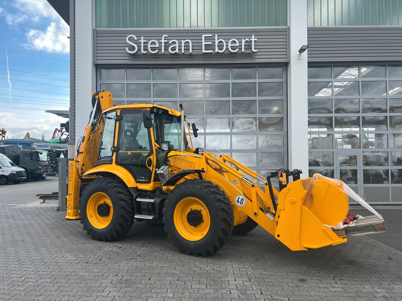 JCB 4CX / Klappschaufel / Dual Drive / Sonderedition - Gravelæssemaskine: billede 1 JCB 4CX / Klappschaufel / Dual Drive / Sonderedition - Gravelæssemaskine: billede 1