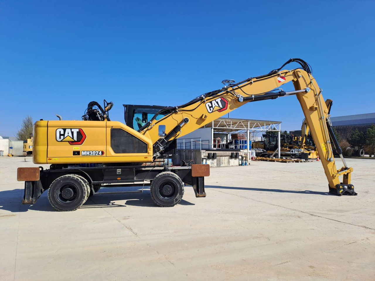 Hjulgravemaskine CAT MH3024: billede 6